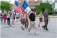 Franklin Veterans Joe Collins and Chuck Bailey marched with Boy and Girl Scout troops in Parade