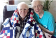 Korean War Veteran David Seyfarth, with his wife Jeanne, received a Quilt of Honor