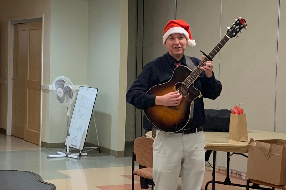 Volunteer guitar instructor Jamie Barrett at the TUNE IT OUT class - December 14, 2021