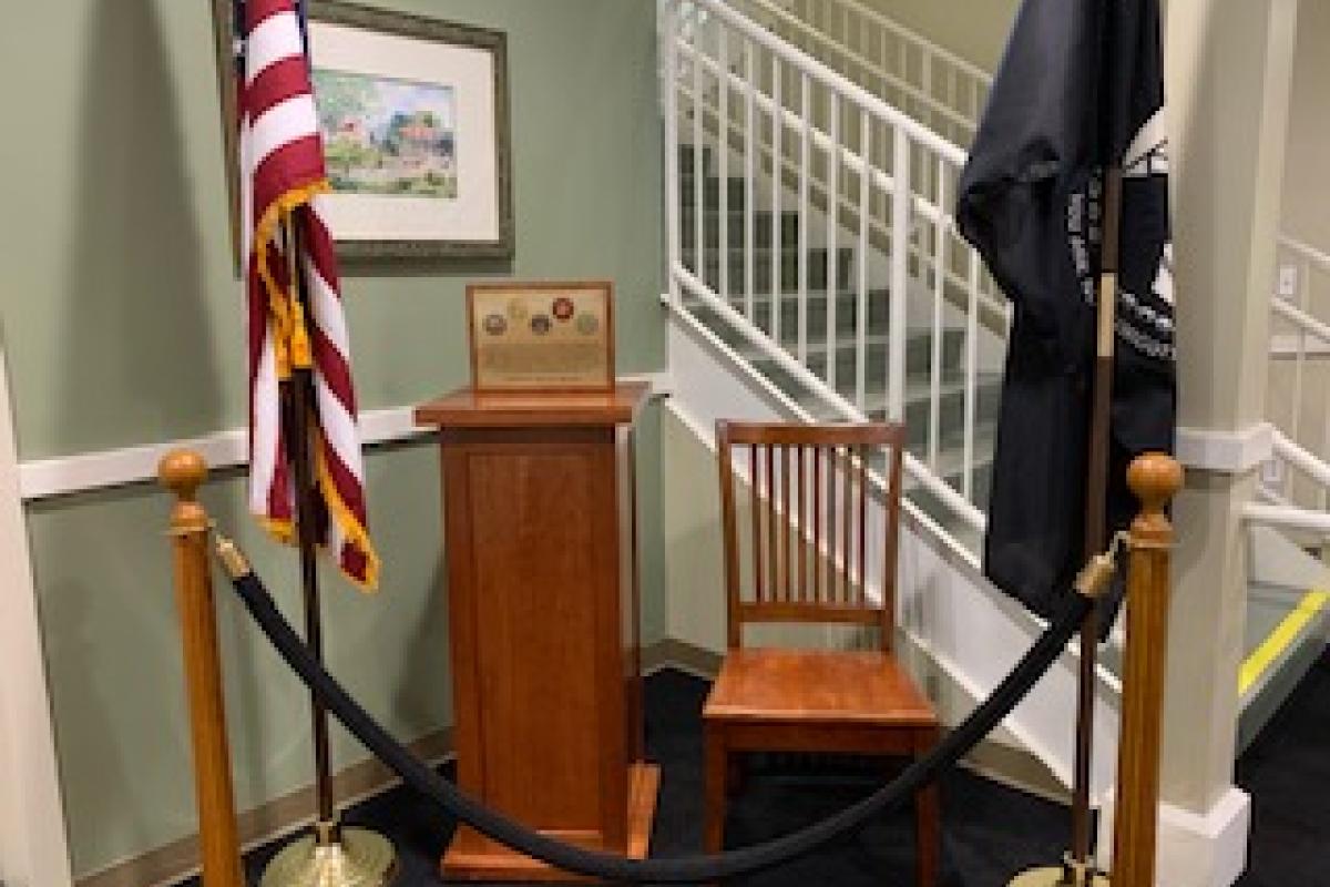 The unoccupied Chair of Honor displayed at the Senior Center honors the 100,000 U.S. service members who remain unaccounted for since World War I.