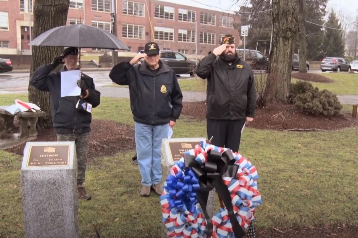 Veterans Bob Markunis, Dick Hynes and Ernest Carruthers pay tribute to Franklin Veteran William O. Martello on January 26, 2024, the anniversary of his death while serving our country.in WWII.