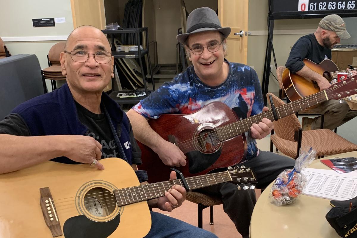 Veterans Leon and Bill enjoying TUNE IT OUT guitar class - December 2021